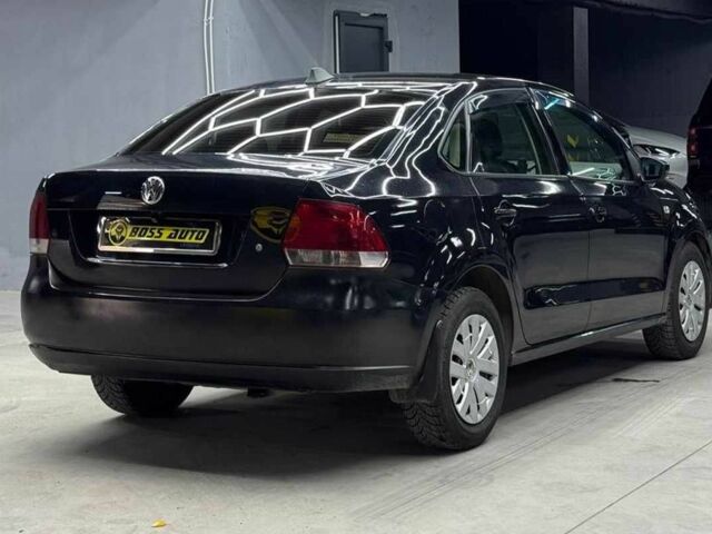 Черный Фольксваген Поло, объемом двигателя 1.6 л и пробегом 226 тыс. км за 7500 $, фото 5 на Automoto.ua