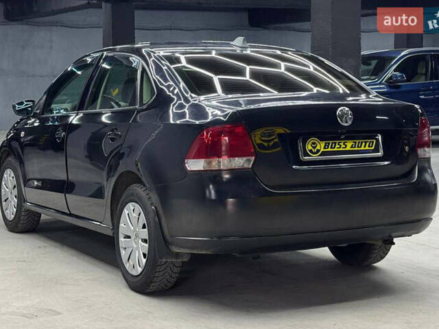 Черный Фольксваген Поло, объемом двигателя 1.6 л и пробегом 226 тыс. км за 7500 $, фото 3 на Automoto.ua