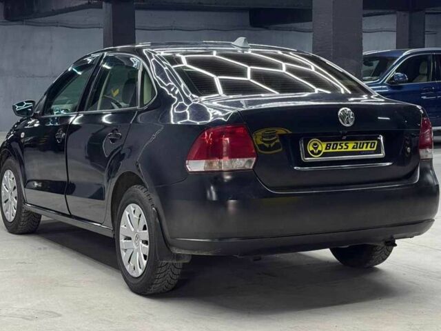 Черный Фольксваген Поло, объемом двигателя 1.6 л и пробегом 226 тыс. км за 7500 $, фото 3 на Automoto.ua