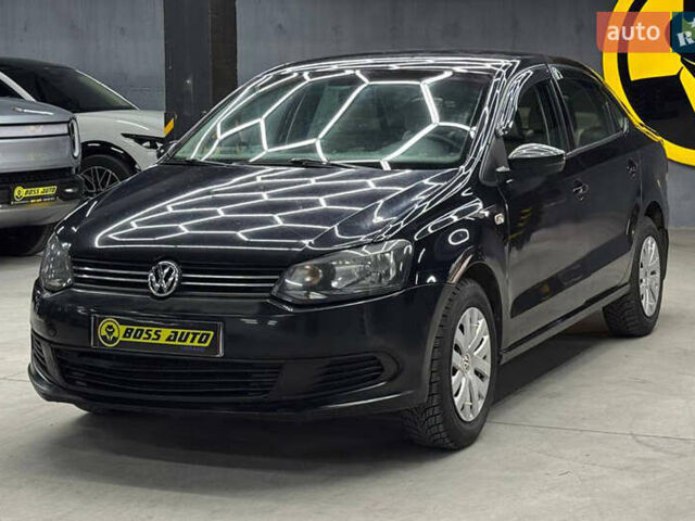 Черный Фольксваген Поло, объемом двигателя 1.6 л и пробегом 226 тыс. км за 7500 $, фото 2 на Automoto.ua