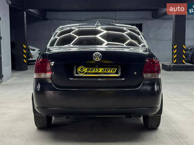 Черный Фольксваген Поло, объемом двигателя 1.6 л и пробегом 226 тыс. км за 7500 $, фото 4 на Automoto.ua
