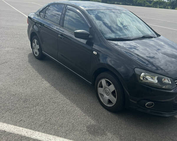 Черный Фольксваген Поло, объемом двигателя 1.6 л и пробегом 198 тыс. км за 6500 $, фото 3 на Automoto.ua