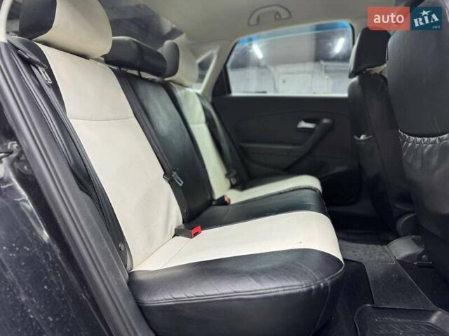 Черный Фольксваген Поло, объемом двигателя 1.6 л и пробегом 226 тыс. км за 7500 $, фото 13 на Automoto.ua