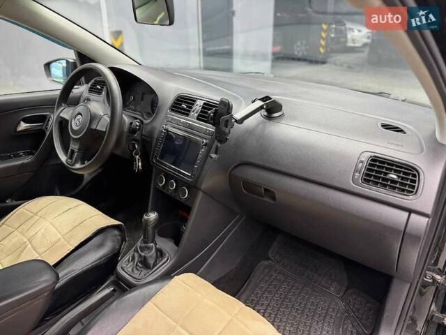 Черный Фольксваген Поло, объемом двигателя 1.6 л и пробегом 226 тыс. км за 7500 $, фото 15 на Automoto.ua