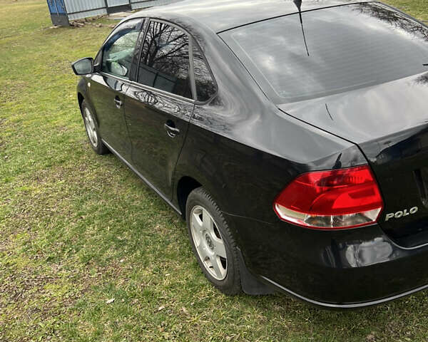 Черный Фольксваген Поло, объемом двигателя 1.6 л и пробегом 198 тыс. км за 6500 $, фото 6 на Automoto.ua