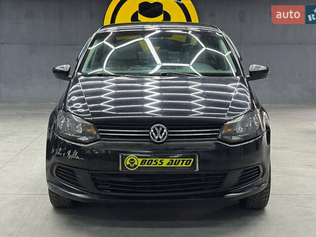Черный Фольксваген Поло, объемом двигателя 1.6 л и пробегом 226 тыс. км за 7500 $, фото 1 на Automoto.ua