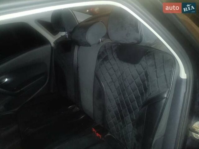 Черный Фольксваген Поло, объемом двигателя 1.6 л и пробегом 66 тыс. км за 9200 $, фото 5 на Automoto.ua