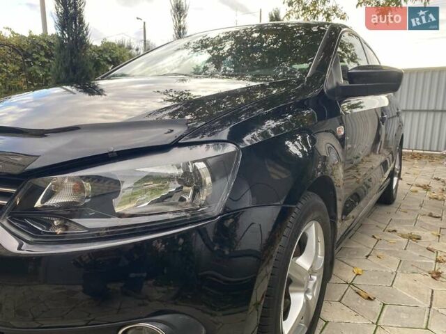 Черный Фольксваген Поло, объемом двигателя 1.6 л и пробегом 70 тыс. км за 8300 $, фото 15 на Automoto.ua