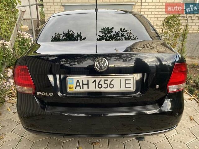 Черный Фольксваген Поло, объемом двигателя 1.6 л и пробегом 70 тыс. км за 8300 $, фото 2 на Automoto.ua