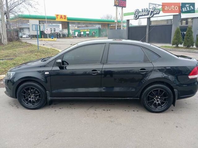 Черный Фольксваген Поло, объемом двигателя 1.6 л и пробегом 253 тыс. км за 6000 $, фото 2 на Automoto.ua