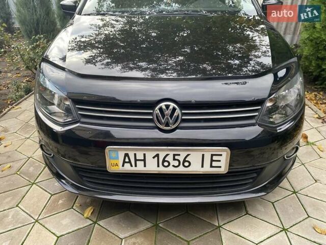 Черный Фольксваген Поло, объемом двигателя 1.6 л и пробегом 70 тыс. км за 8300 $, фото 1 на Automoto.ua