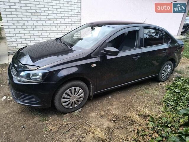 Черный Фольксваген Поло, объемом двигателя 1.6 л и пробегом 182 тыс. км за 6300 $, фото 1 на Automoto.ua