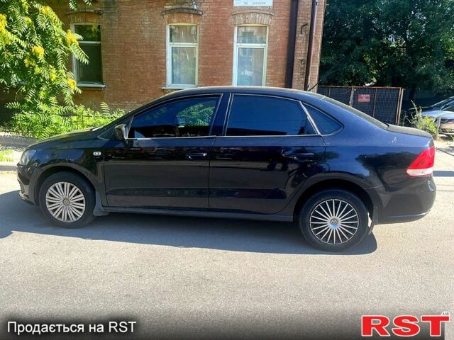 Черный Фольксваген Поло, объемом двигателя 1.6 л и пробегом 218 тыс. км за 7555 $, фото 1 на Automoto.ua