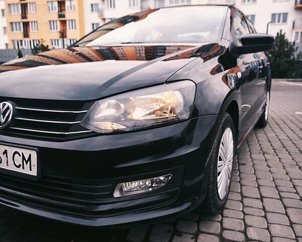 Черный Фольксваген Поло, объемом двигателя 1.4 л и пробегом 126 тыс. км за 8300 $, фото 2 на Automoto.ua
