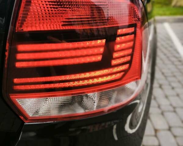 Черный Фольксваген Поло, объемом двигателя 1.4 л и пробегом 126 тыс. км за 8300 $, фото 7 на Automoto.ua