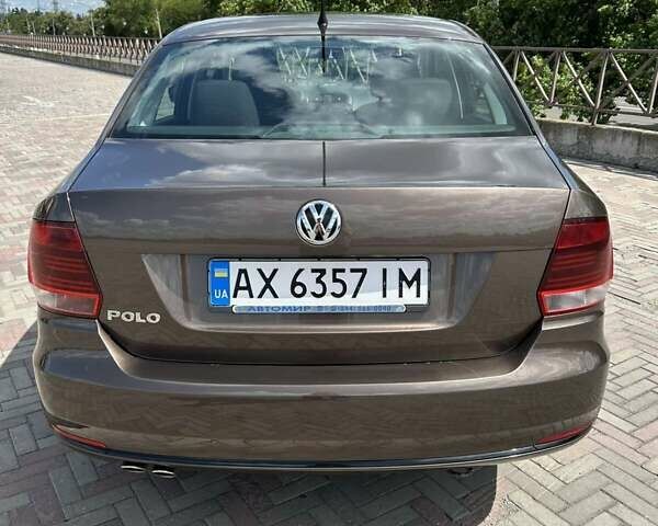 Коричневый Фольксваген Поло, объемом двигателя 1.4 л и пробегом 97 тыс. км за 9700 $, фото 1 на Automoto.ua