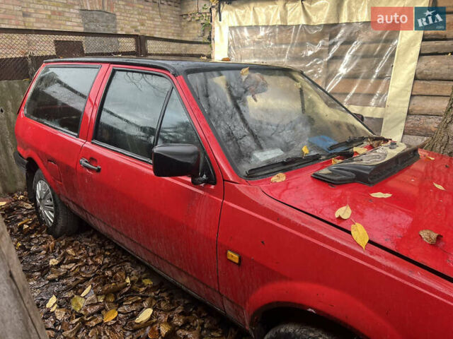 Красный Фольксваген Поло, объемом двигателя 1.04 л и пробегом 200 тыс. км за 1100 $, фото 1 на Automoto.ua