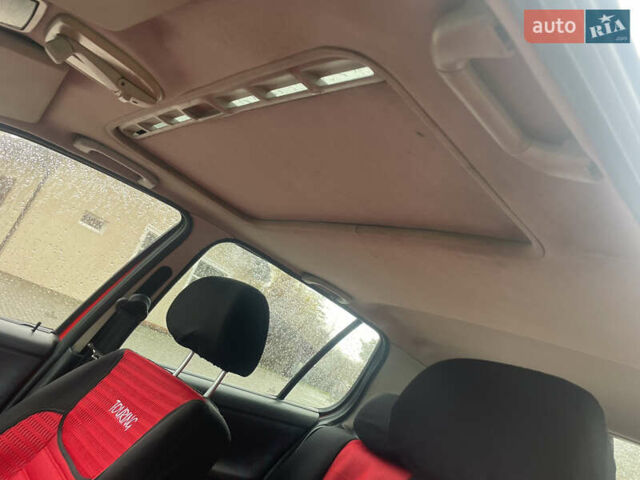 Червоний Фольксваген Поло, об'ємом двигуна 1.3 л та пробігом 200 тис. км за 2200 $, фото 10 на Automoto.ua