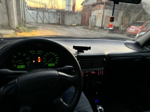 Червоний Фольксваген Поло, об'ємом двигуна 1.4 л та пробігом 266 тис. км за 1500 $, фото 7 на Automoto.ua