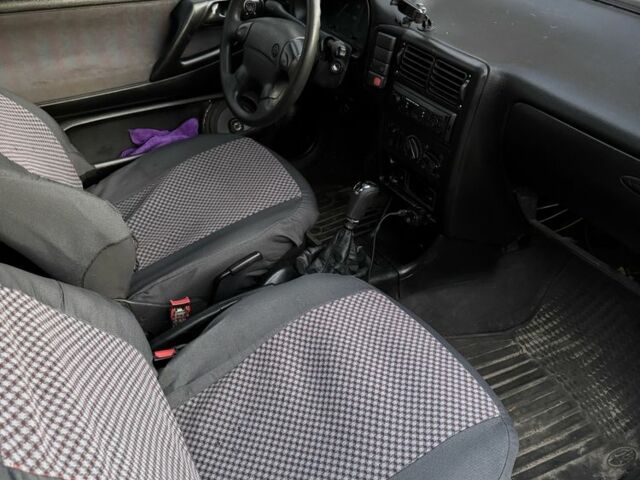 Червоний Фольксваген Поло, об'ємом двигуна 1.4 л та пробігом 266 тис. км за 1500 $, фото 5 на Automoto.ua