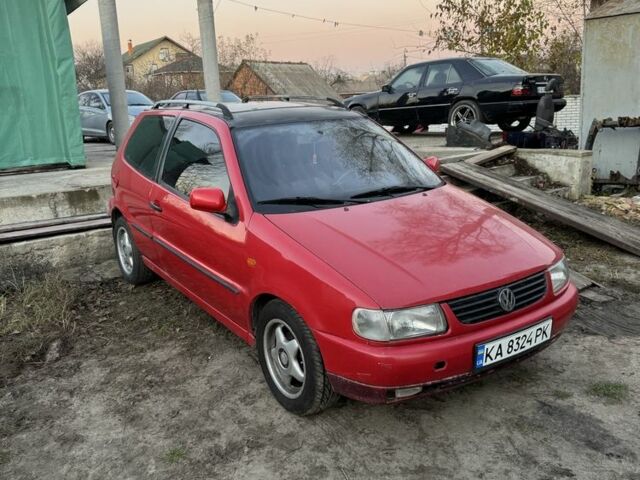 Червоний Фольксваген Поло, об'ємом двигуна 1.4 л та пробігом 266 тис. км за 1500 $, фото 1 на Automoto.ua