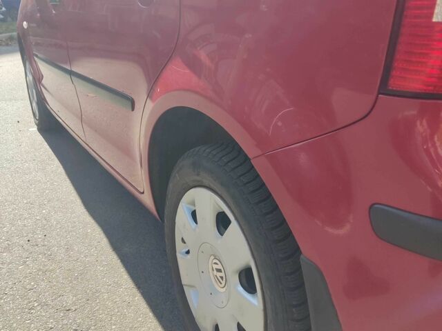 Красный Фольксваген Поло, объемом двигателя 1.4 л и пробегом 160 тыс. км за 5000 $, фото 6 на Automoto.ua