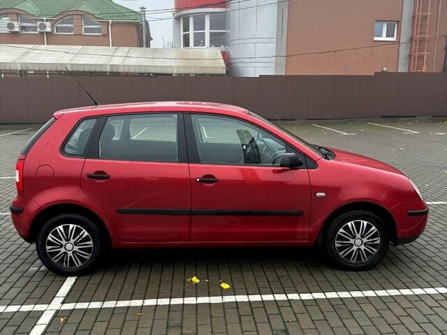 Красный Фольксваген Поло, объемом двигателя 1.4 л и пробегом 150 тыс. км за 4100 $, фото 6 на Automoto.ua