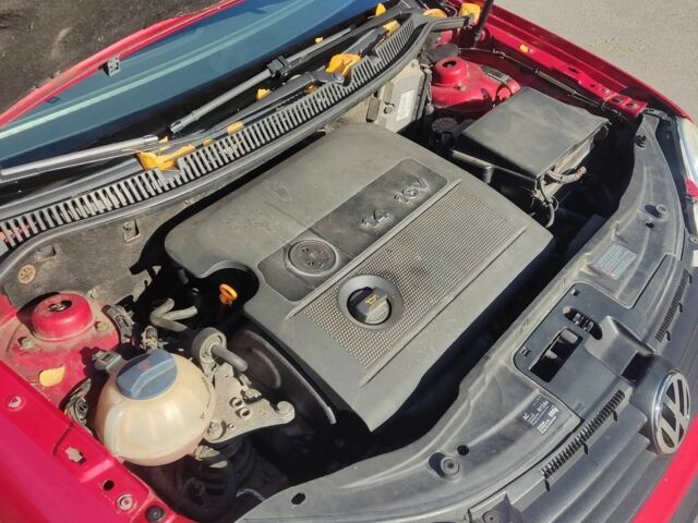 Красный Фольксваген Поло, объемом двигателя 1.4 л и пробегом 160 тыс. км за 5000 $, фото 12 на Automoto.ua