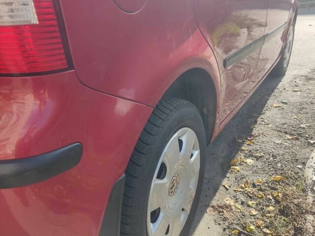 Красный Фольксваген Поло, объемом двигателя 1.4 л и пробегом 160 тыс. км за 5000 $, фото 4 на Automoto.ua