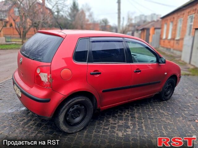 Червоний Фольксваген Поло, об'ємом двигуна 1.4 л та пробігом 220 тис. км за 2400 $, фото 2 на Automoto.ua