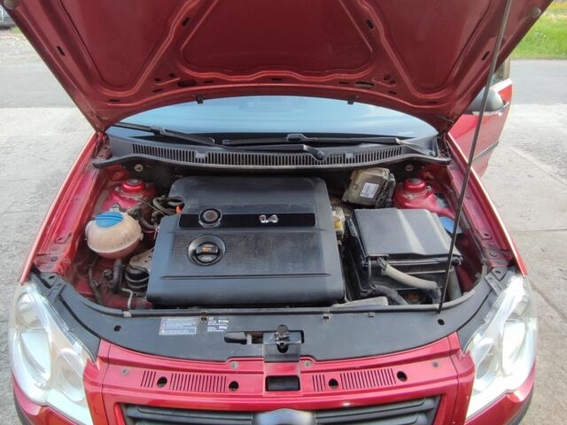 Червоний Фольксваген Поло, об'ємом двигуна 1.4 л та пробігом 145 тис. км за 4950 $, фото 6 на Automoto.ua