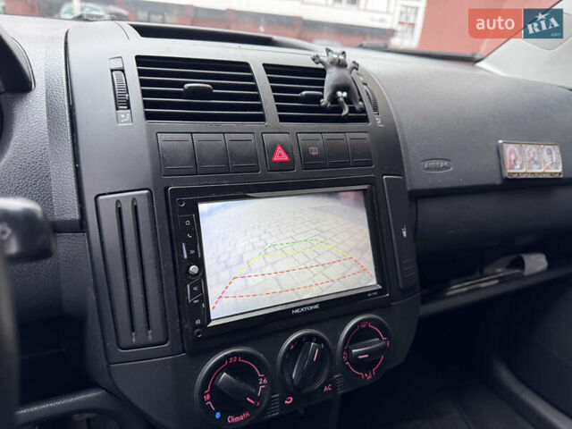 Красный Фольксваген Поло, объемом двигателя 1.4 л и пробегом 235 тыс. км за 5500 $, фото 22 на Automoto.ua