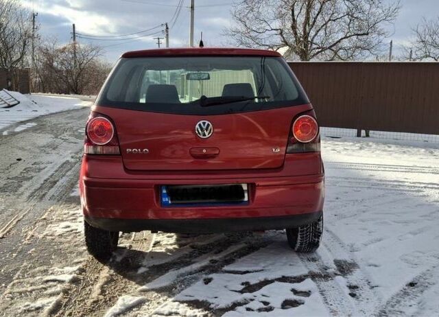 Червоний Фольксваген Поло, об'ємом двигуна 1.4 л та пробігом 220 тис. км за 4100 $, фото 1 на Automoto.ua
