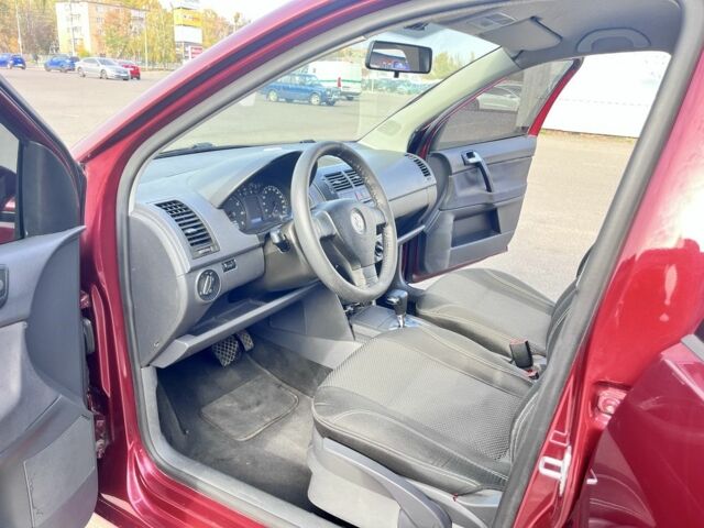 Червоний Фольксваген Поло, об'ємом двигуна 1.4 л та пробігом 178 тис. км за 5300 $, фото 6 на Automoto.ua