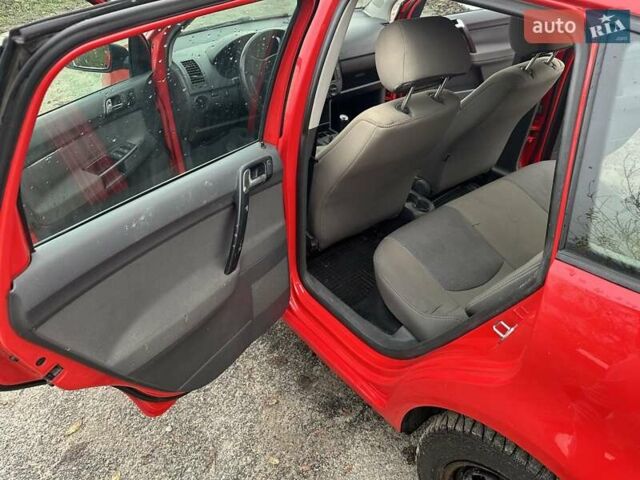 Красный Фольксваген Поло, объемом двигателя 1.4 л и пробегом 202 тыс. км за 4900 $, фото 12 на Automoto.ua