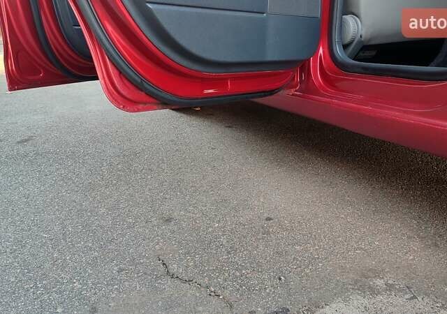 Красный Фольксваген Поло, объемом двигателя 1.4 л и пробегом 240 тыс. км за 4950 $, фото 17 на Automoto.ua