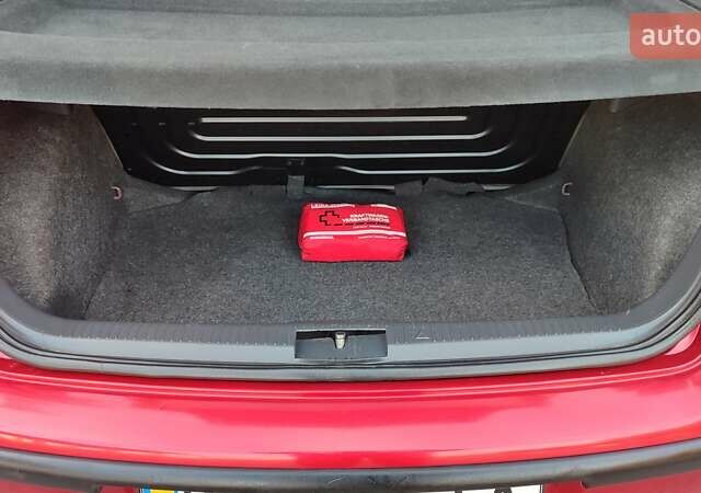 Красный Фольксваген Поло, объемом двигателя 1.4 л и пробегом 240 тыс. км за 4950 $, фото 23 на Automoto.ua