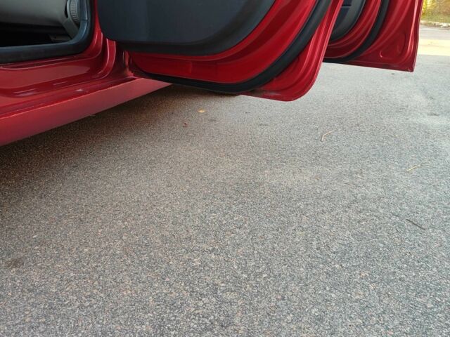 Красный Фольксваген Поло, объемом двигателя 1.4 л и пробегом 240 тыс. км за 4950 $, фото 16 на Automoto.ua