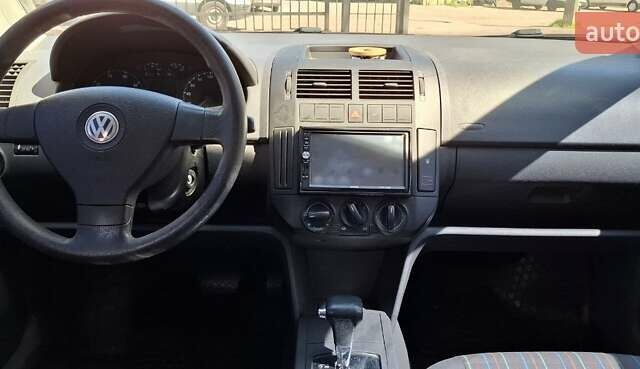 Червоний Фольксваген Поло, об'ємом двигуна 1.4 л та пробігом 202 тис. км за 5699 $, фото 4 на Automoto.ua