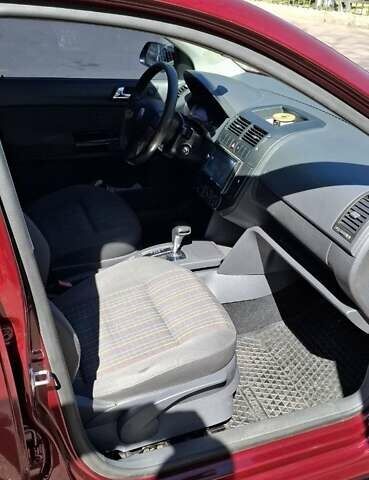 Червоний Фольксваген Поло, об'ємом двигуна 1.4 л та пробігом 202 тис. км за 5699 $, фото 2 на Automoto.ua