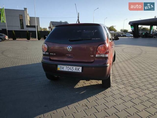 Червоний Фольксваген Поло, об'ємом двигуна 1.39 л та пробігом 339 тис. км за 3850 $, фото 2 на Automoto.ua