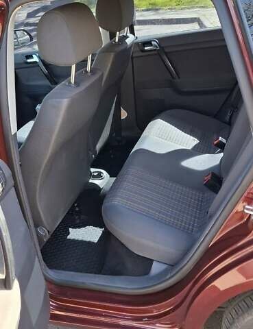 Червоний Фольксваген Поло, об'ємом двигуна 1.4 л та пробігом 202 тис. км за 5699 $, фото 6 на Automoto.ua