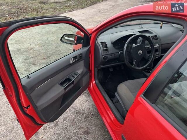 Красный Фольксваген Поло, объемом двигателя 1.4 л и пробегом 202 тыс. км за 4900 $, фото 11 на Automoto.ua