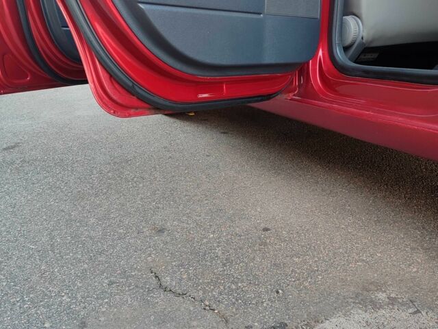 Красный Фольксваген Поло, объемом двигателя 1.4 л и пробегом 240 тыс. км за 4950 $, фото 15 на Automoto.ua