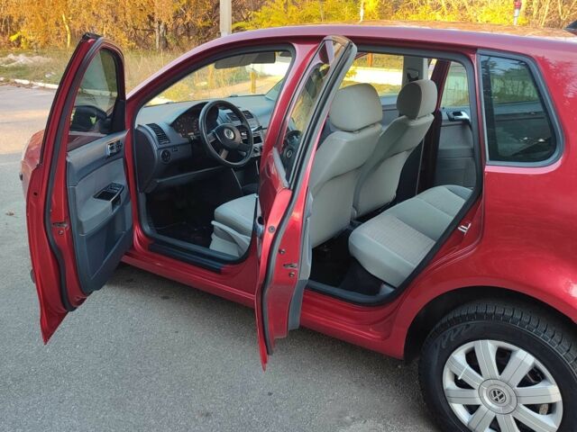 Красный Фольксваген Поло, объемом двигателя 1.4 л и пробегом 240 тыс. км за 4950 $, фото 18 на Automoto.ua