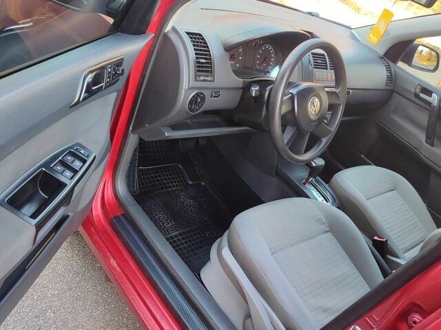 Красный Фольксваген Поло, объемом двигателя 1.4 л и пробегом 240 тыс. км за 4950 $, фото 14 на Automoto.ua