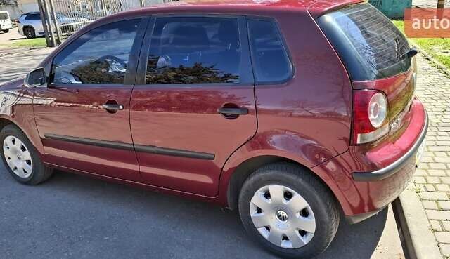 Червоний Фольксваген Поло, об'ємом двигуна 1.4 л та пробігом 202 тис. км за 5699 $, фото 9 на Automoto.ua