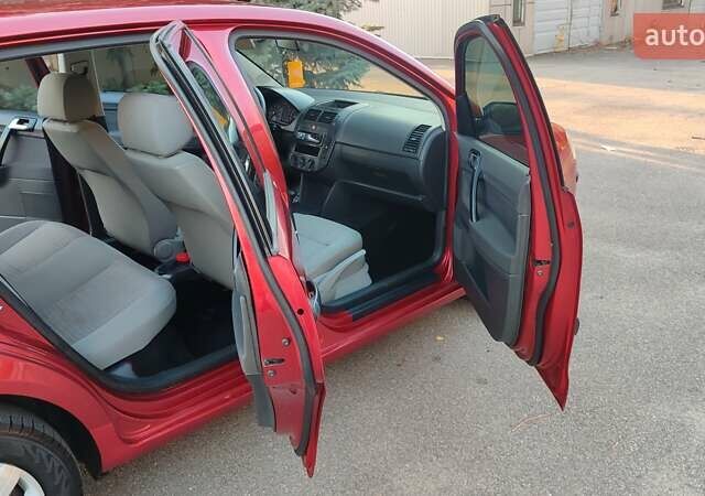 Красный Фольксваген Поло, объемом двигателя 1.4 л и пробегом 240 тыс. км за 4950 $, фото 19 на Automoto.ua