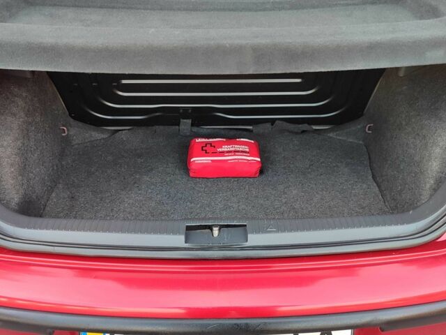 Красный Фольксваген Поло, объемом двигателя 1.4 л и пробегом 240 тыс. км за 4950 $, фото 20 на Automoto.ua