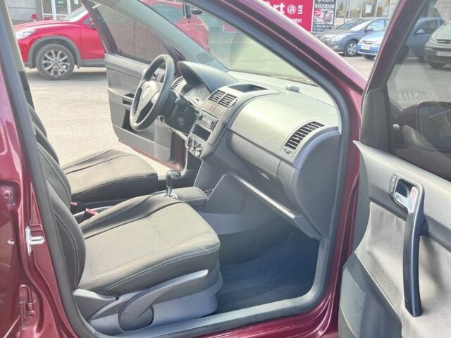 Червоний Фольксваген Поло, об'ємом двигуна 1.4 л та пробігом 178 тис. км за 5300 $, фото 13 на Automoto.ua